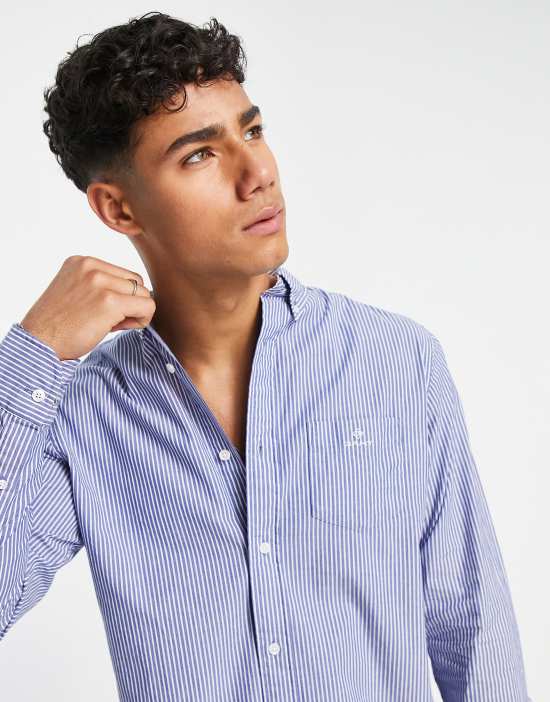 https://images.asos-media.com/products/gant-logo-pocket-regular-fit-stripe-poplin-button-down-shirt-in-blue/202832612-3?$n_550w$&wid=550&fit=constrain