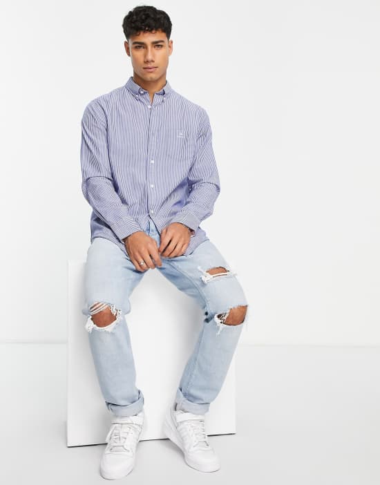 https://images.asos-media.com/products/gant-logo-pocket-regular-fit-stripe-poplin-button-down-shirt-in-blue/202832612-4?$n_550w$&wid=550&fit=constrain