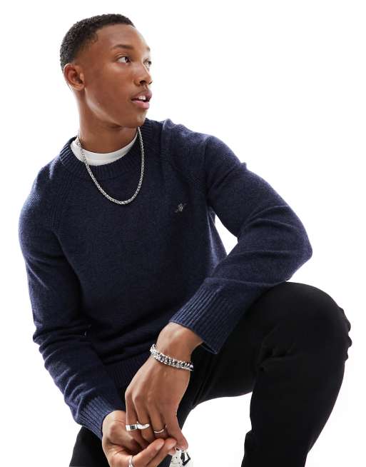 GANT - Maglione blu navy mélange in misto lana d'agnello bicolore con maniche raglan e logo dello scudo