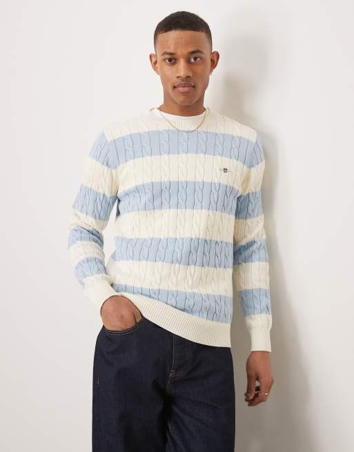 GANT - Maglione lavorato a trecce in cotone azzurro a righe colorblock con logo dello scudo