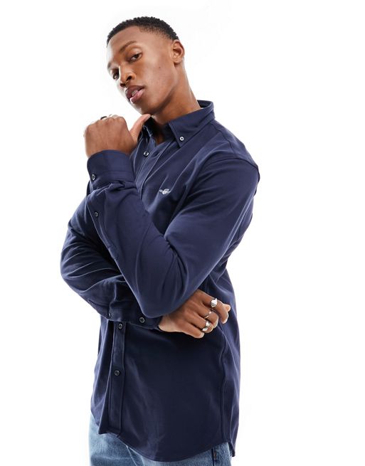 GANT – Marinblå pikéskjorta i jersey med sköldlogga