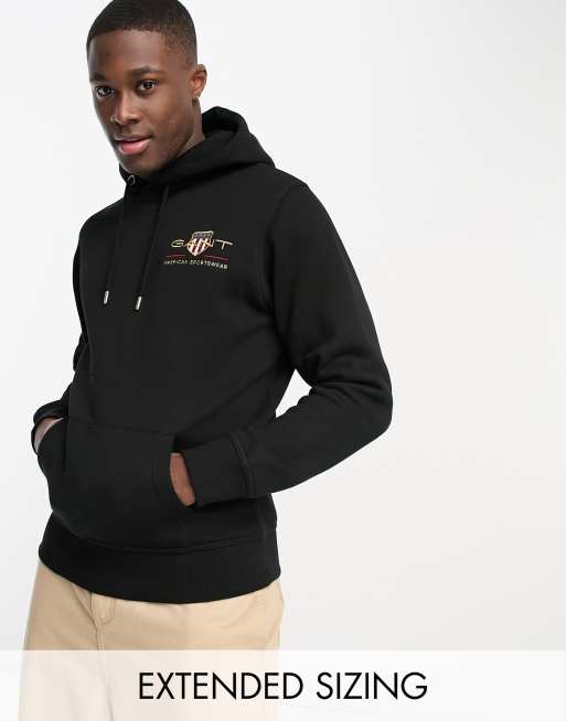 GANT medium archive shield logo hoodie in black | ASOS