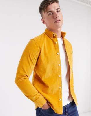 gold button down shirt