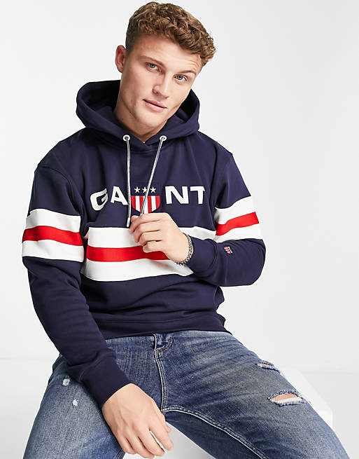 GANT retro shield logo chest stripe hoodie relaxed fit in navy | ASOS