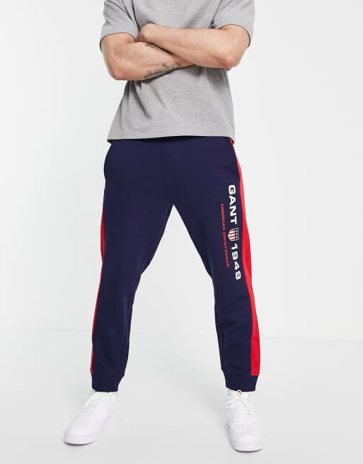 GANT retro shield logo cuffed joggers in navy/red, 4 of 4