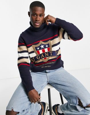 GANT roll neck knit jumper with large logo in navy with stripe