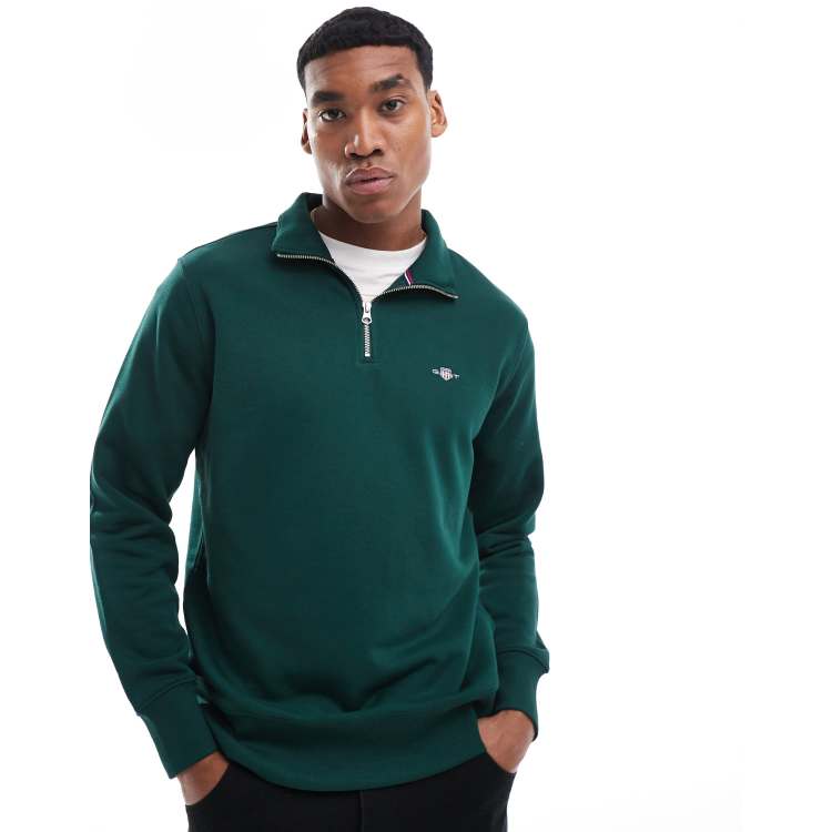 GANT shield logo half zip sweatshirt in dark green | ASOS