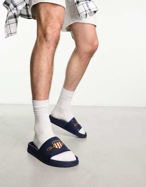 GANT – Slider in Marineblau mit Wappenlogo