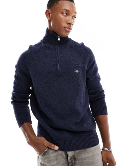 GANT – Strickpullover aus zweifarbigem Lammwoll-Mix in Marineblau meliert mit Raglanärmeln, Wappenlogo und kurzem Reißverschluss