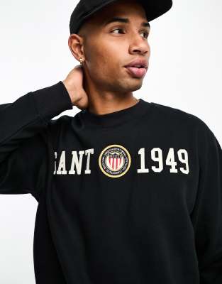 GANT 1949 crest logo applique relaxed fit sweatshirt in black - ASOS Price Checker