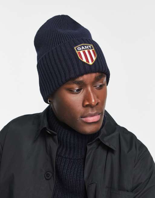 GANT - Wollen beanie in marineblauw met groot schildlogo