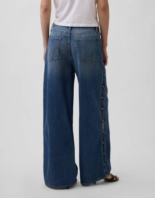 GAP mid rise relaxed fit baggy jeans with silver hardware detailing in mid blue, 2 of 3