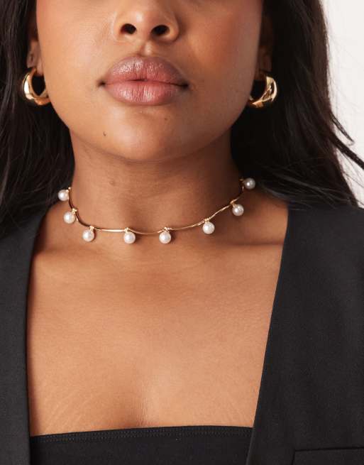 Gargantilla dorada con detalle de eslabones alargados y perlas de imitación de ASOS DESIGN Curve