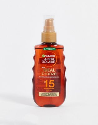 Garnier Ambre Solaire Ideal Bronze Protective Oil Sun Cream Spray SPF15 150ml - ASOS Price Checker