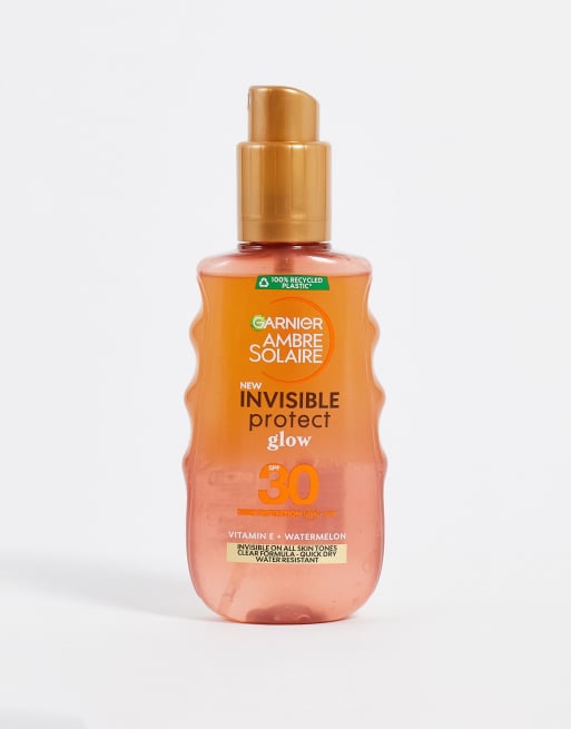 Garnier – Ambre Solaire – Rozświetlająca przezroczysta emulsja do opalania w sprayu z filtrem SPF 30, 150 ml