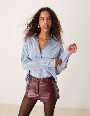 Ghospell Asymmetric Bow Back Shirt In Blue