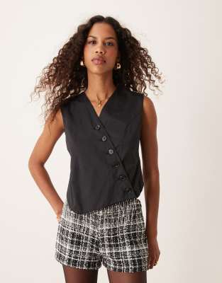 asymmetric tailored wrap top in black