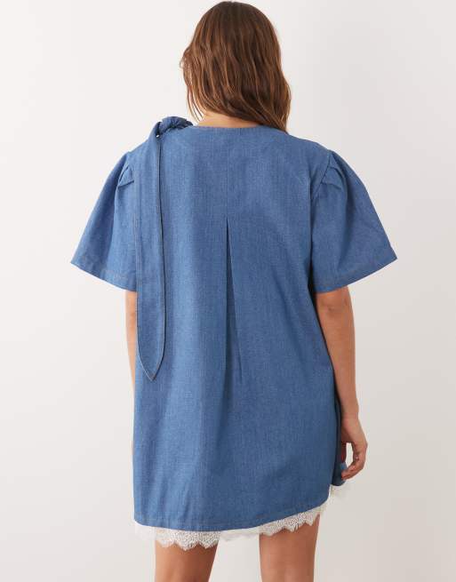 Ghospell – Blå miniklänning i denim med puffärmar, spetskant och omlottdesign, 4 av 4