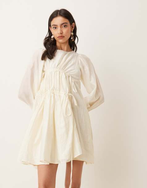 Ghospell exclusive gathered bow tie detail cinch sleeve mini dress in cream