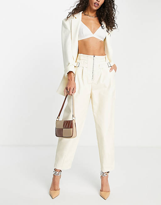 Ghospell faux leather trousers in cream