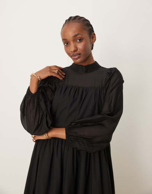 Ghospell Harriet tiered midi dress in black | ASOS