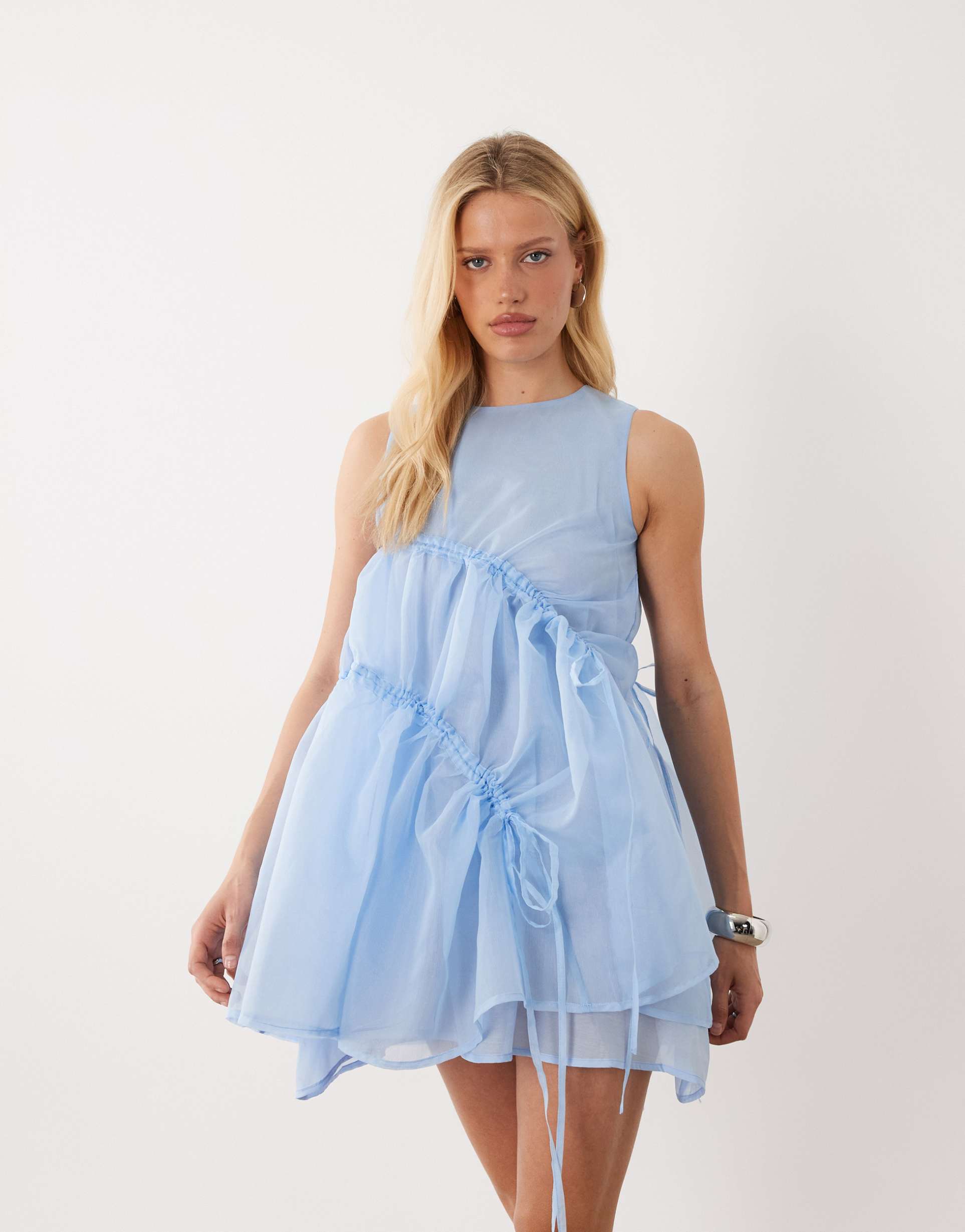 ghospell indie mesh overlay sleeveless drawstring detail mini dress in light blue