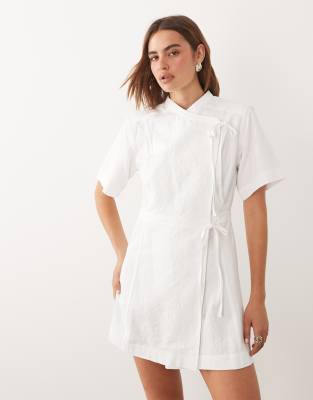 Ghospell Jacquard Short Sleeve Wrap Bow Detail Mini Dress In White