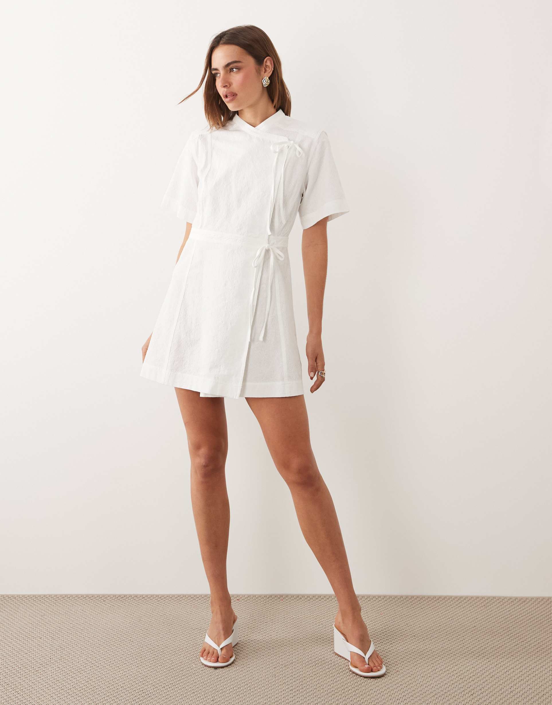 ghospell jacquard short sleeve wrap bow detail mini dress in white