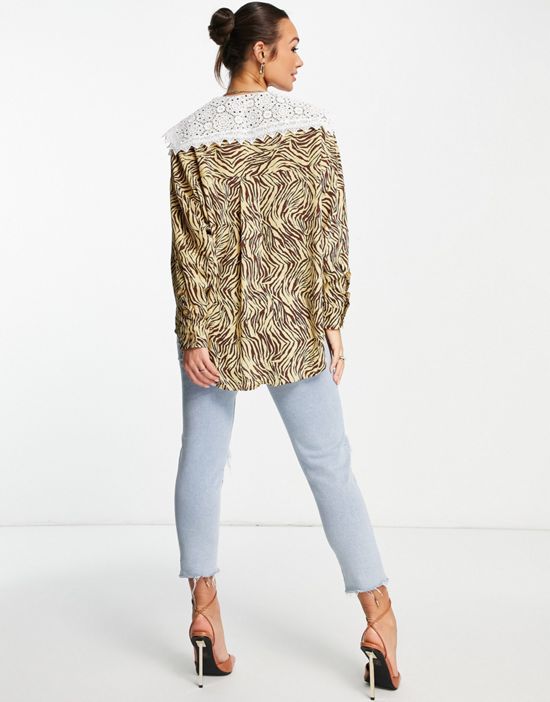 https://images.asos-media.com/products/ghospell-long-sleeve-blouse-in-tonal-animal-print-with-oversized-lace-collar/202381092-3?$n_550w$&wid=550&fit=constrain
