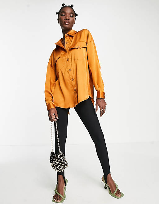 Ghospell oversized satin shirt with open back in rust