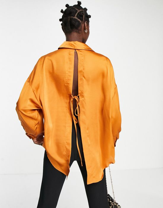 https://images.asos-media.com/products/ghospell-oversized-satin-shirt-with-open-back-in-rust/202381050-2?$n_550w$&wid=550&fit=constrain