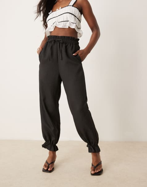 Ghospell relaxed trousers in coal black