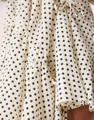 ghospell ruched asymmetric polka dot mini dress in pearl ivory