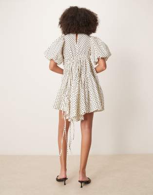 ghospell ruched asymmetric polka dot mini dress in pearl ivory