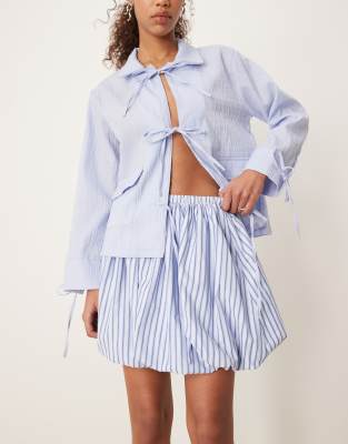 ghospell stripe puffball mini skirt in sky blue