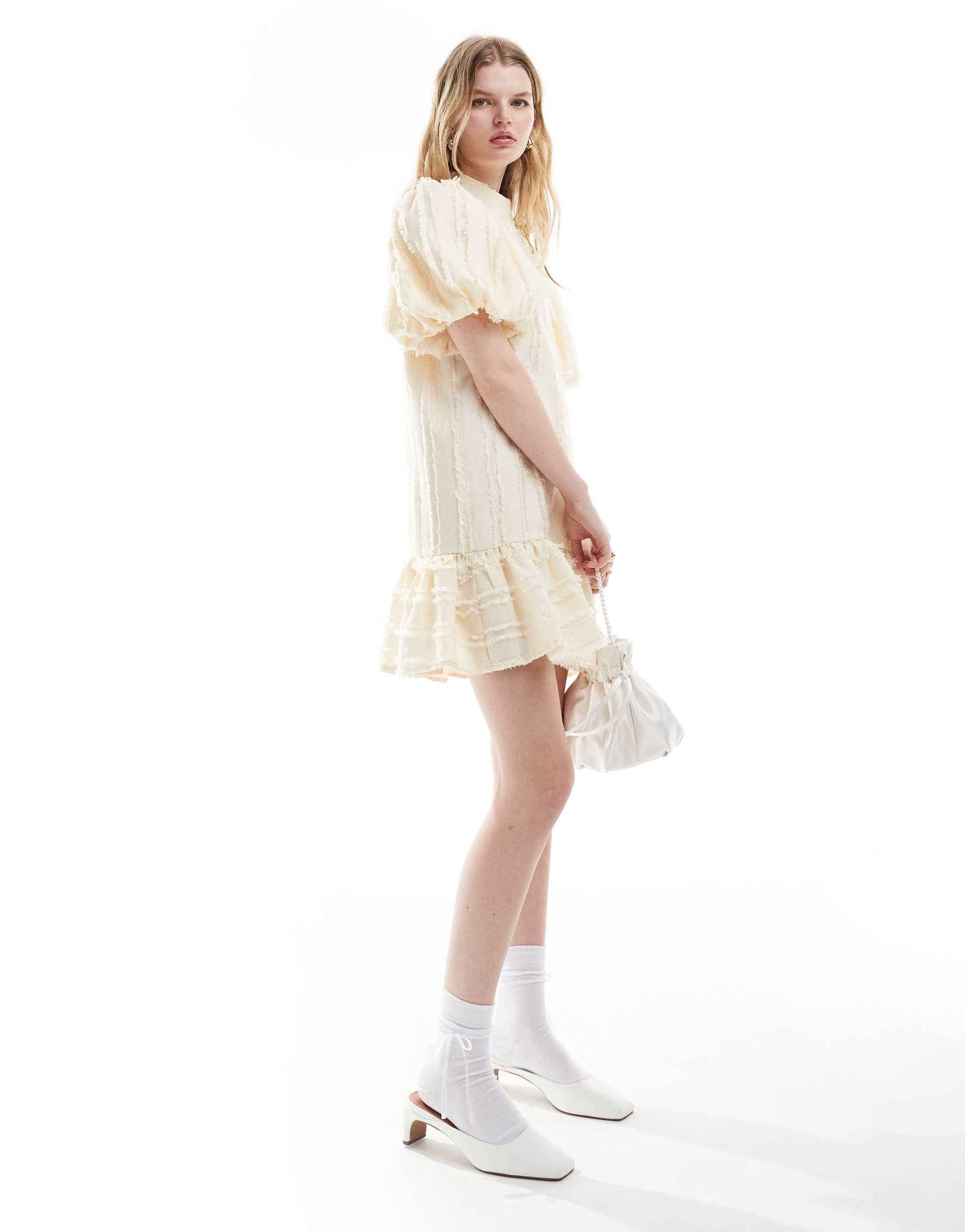 ghospell textured puff sleeve mini dress in ivory