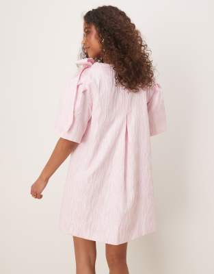 ghospell wrap mini dress with oversized bow detail in pink zebra print