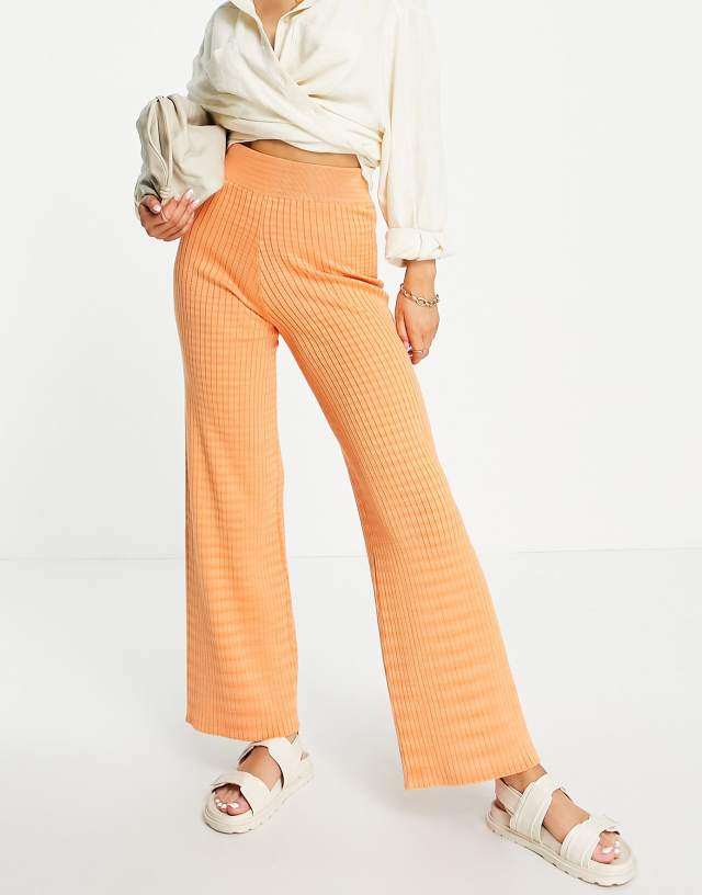 Gianni Feraud spaceknit wide leg sweatpants in orange - part of a set