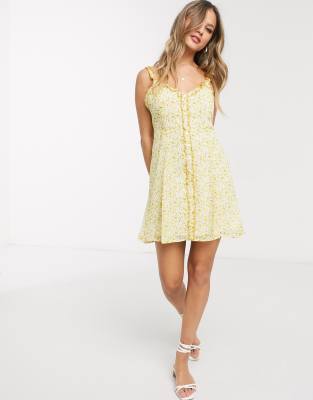 yellow dress with buttons down the front