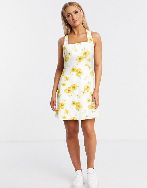Gilli mini dress with tie back detail in yellow floral