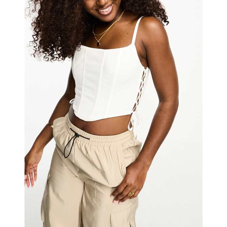 Gilly Hicks corset top with tie side detail in white | ASOS