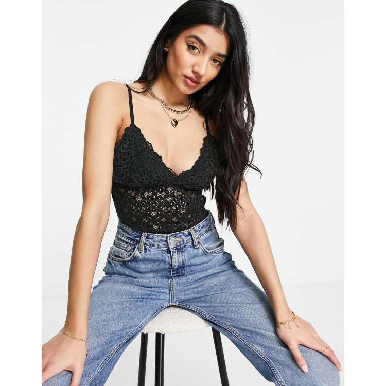 Gilly Hicks lace bodysuit in black | ASOS