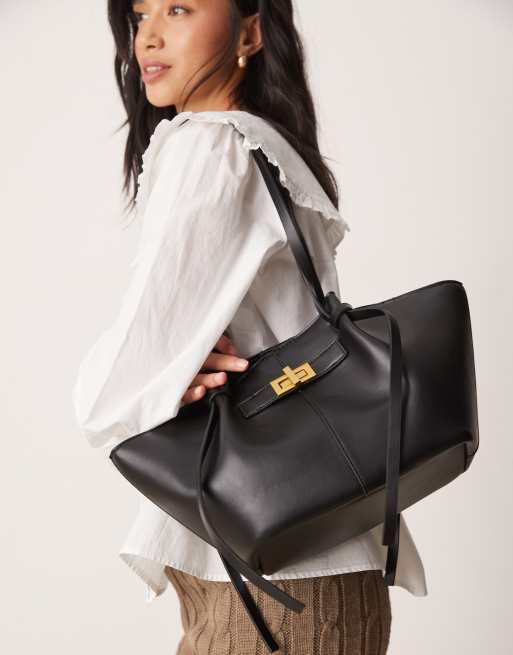 Gina Tricot - Borsa shopping piccola in pelle sintetica nera con tracolla e pochette