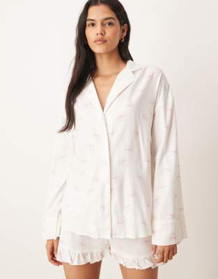 Gina Tricot - Chemise de pyjama manches longues en flanelle à imprimé nauds à assortir - Blanc et rose