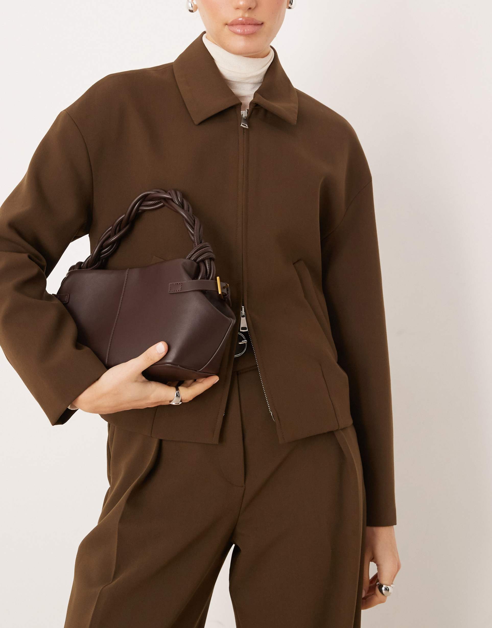 gina tricot crossbody purse with braided top handle detailing in chocolate brown