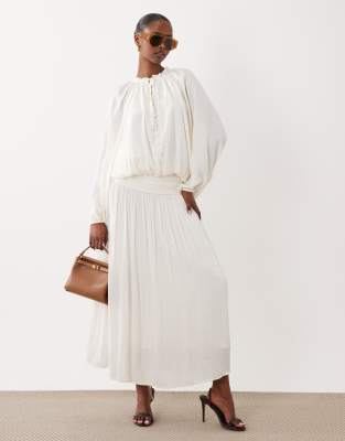 Gina Tricot dropped waist pleated midaxi skirt in off white | ASOS