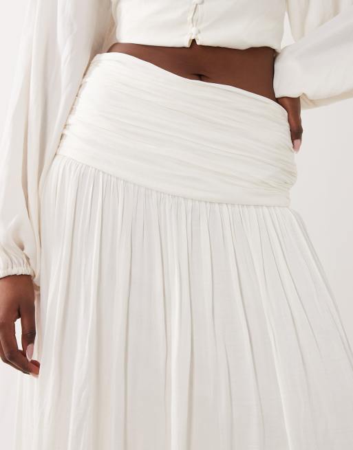 Gina Tricot dropped waist pleated midaxi skirt in off white | ASOS