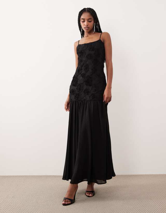 Gina Tricot embroidery dropped waist midi dress in black | ASOS