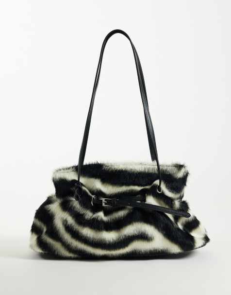 Gina Tricot faux fur shoulder bag with strap and clutch detail in zebra - view 1