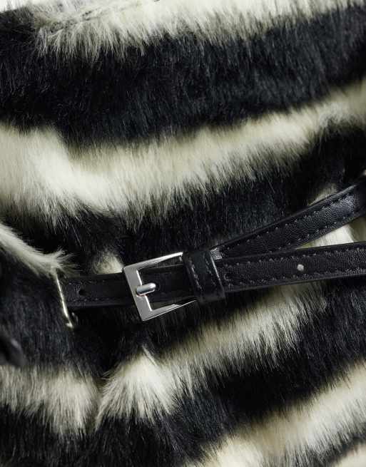 Gina Tricot faux fur shoulder bag with strap and clutch detail in zebra ...
